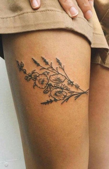 female tattoo designs for thigh|cute thigh tattoos for females.